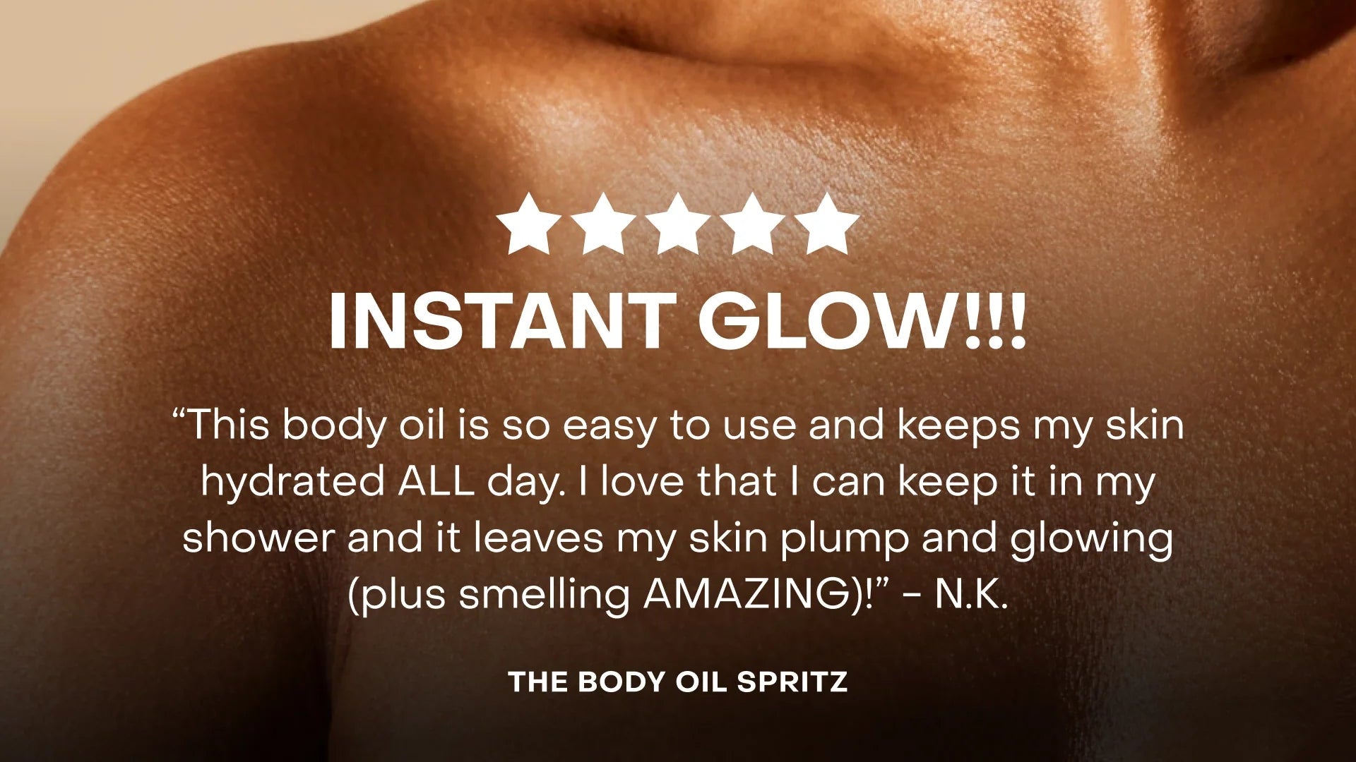 Close-up of a person's shoulder with text about a body oil product.